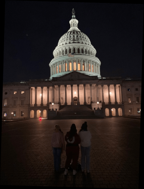Leah, Claudia and Isabella contemplate the Capitol