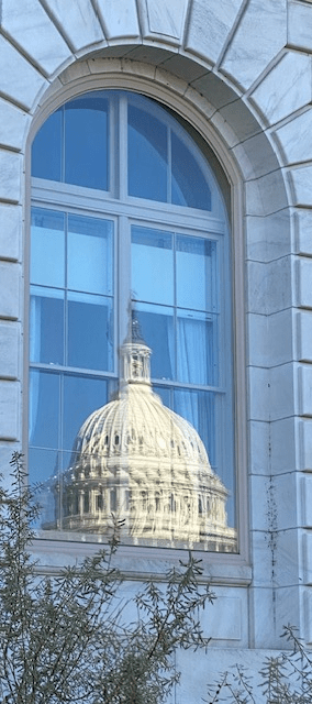 Reflections of the U.S. Capitol in the Carroll Office Building